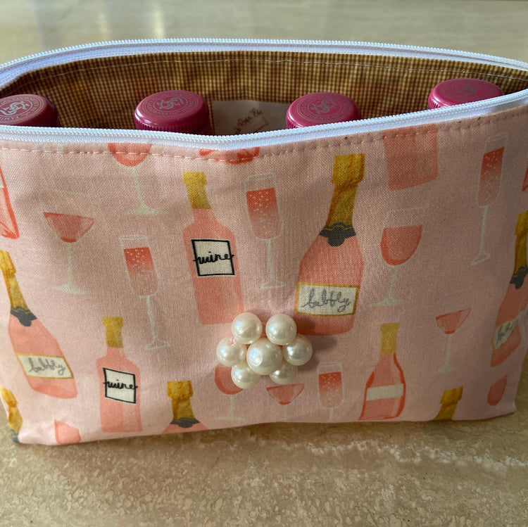 Pink wine/champagne cosmetic bag