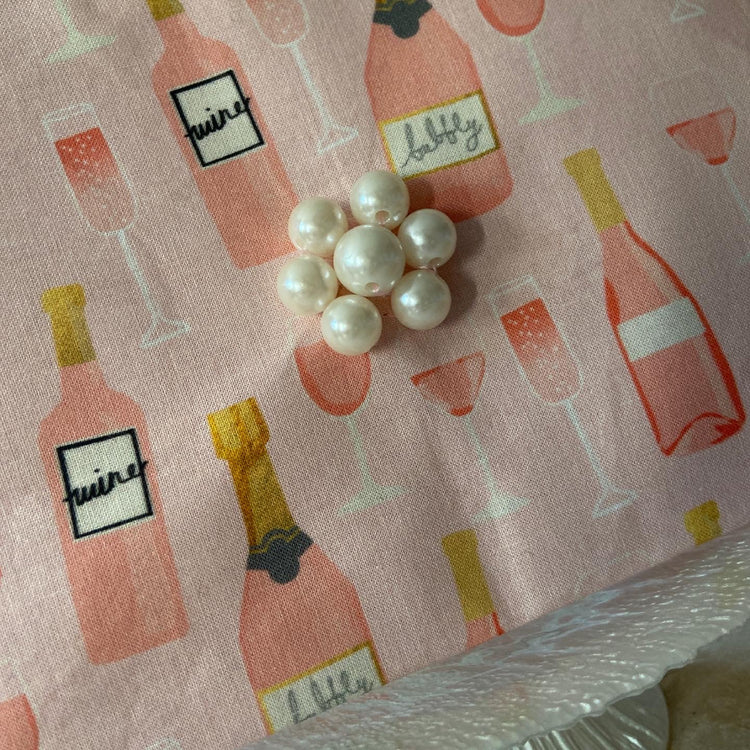 Pink wine/champagne cosmetic bag