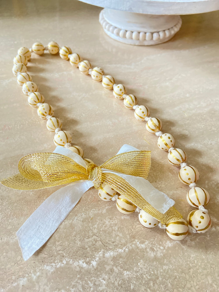 Hand painted gold wooden bead necklace