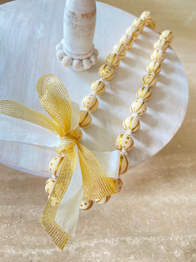 Hand painted gold wooden bead necklace
