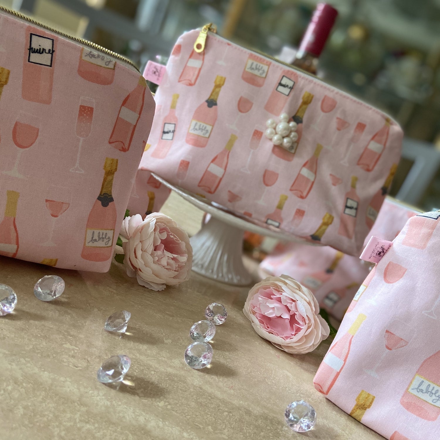 Pink wine/champagne cosmetic bag