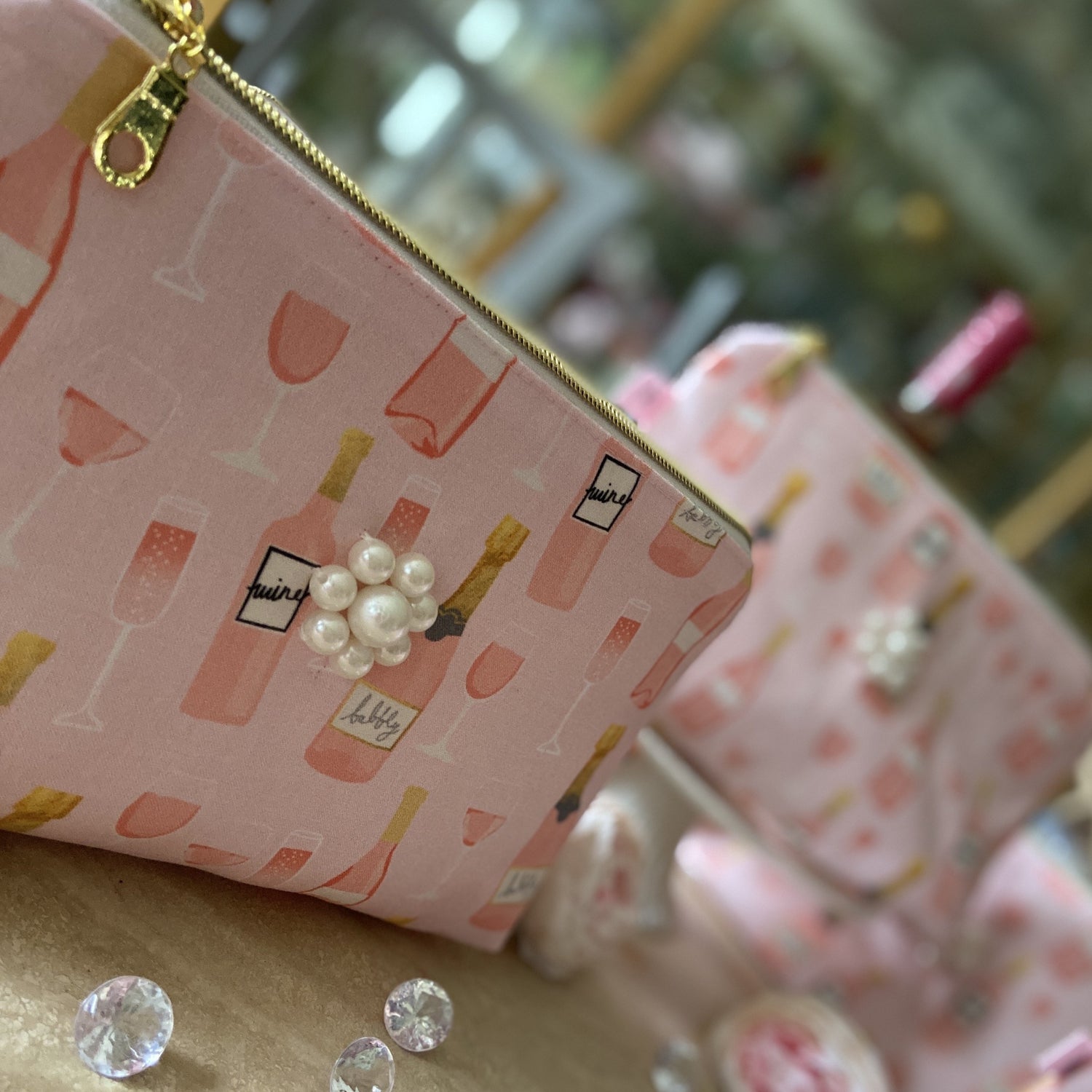 Pink wine/champagne cosmetic bag
