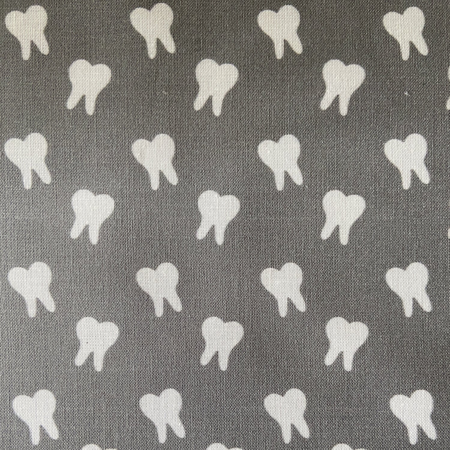 Gray and white teeth fabric print