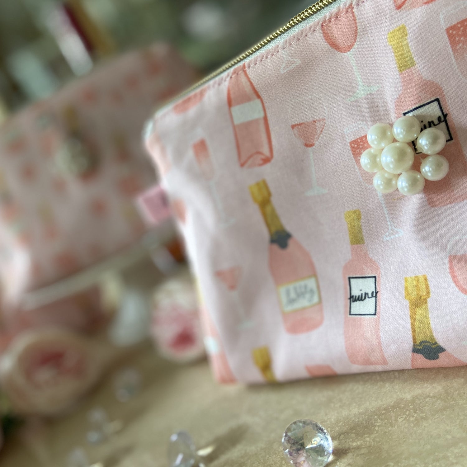Pink wine/champagne cosmetic bag