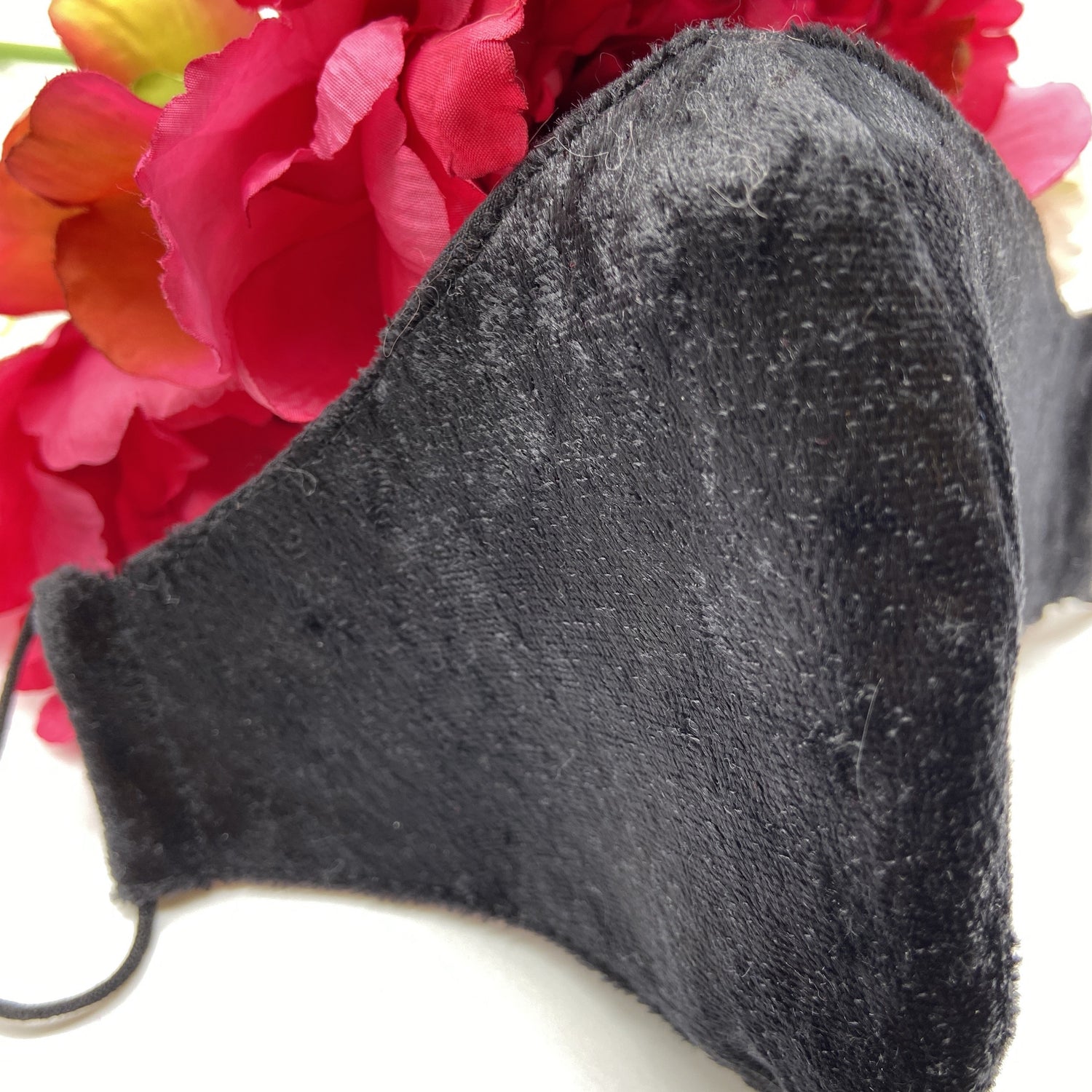 Soft black mask with pearl ear adjusters 