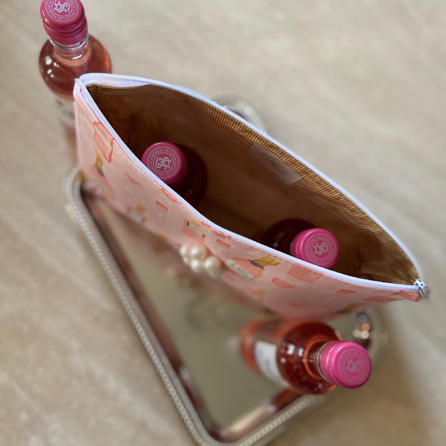 Pink wine/champagne cosmetic bag