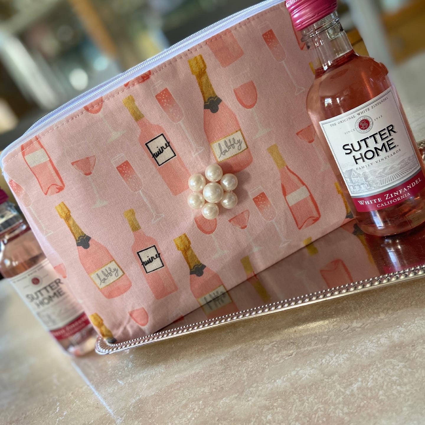 Pink wine/champagne cosmetic bag