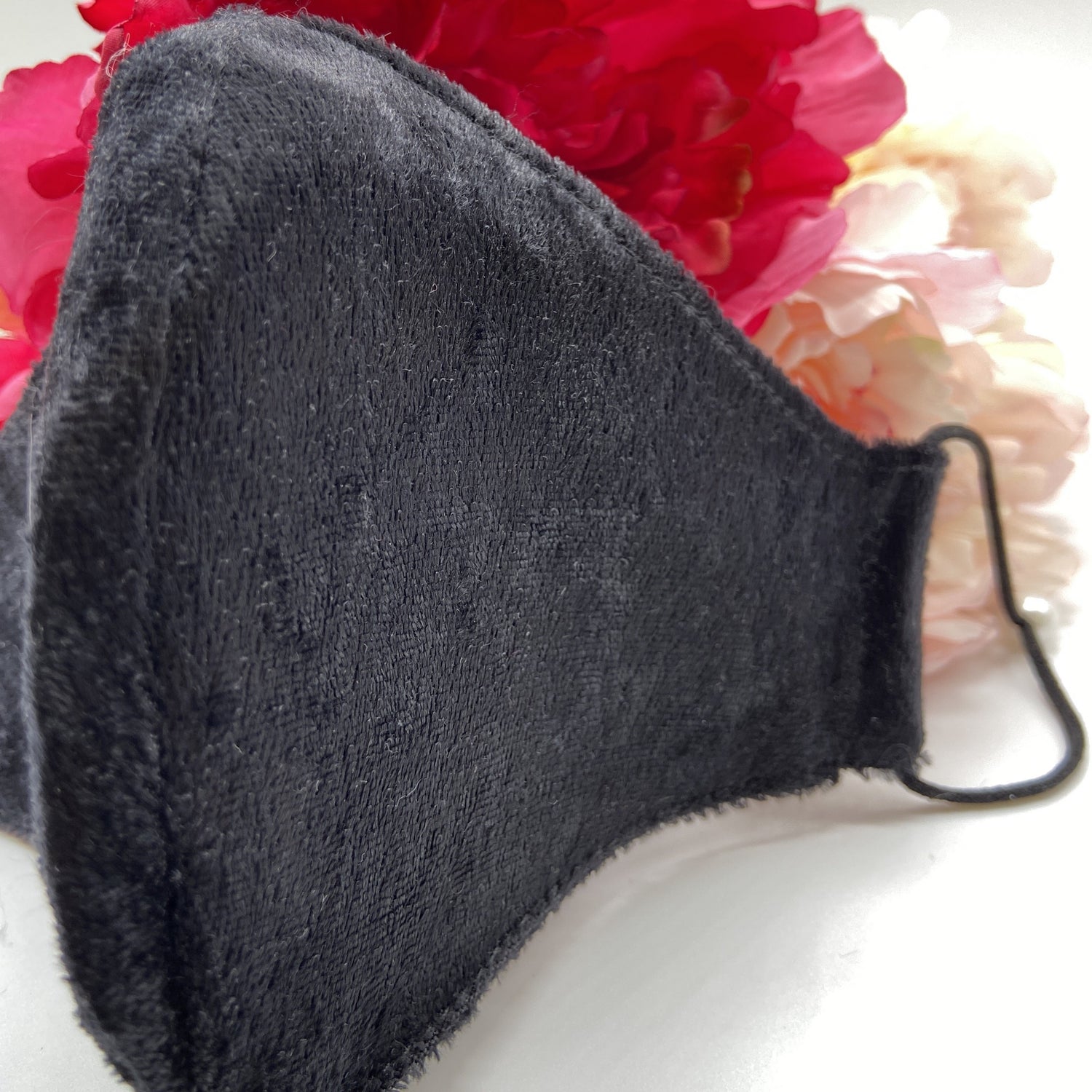 Soft black mask with pearl ear adjusters 