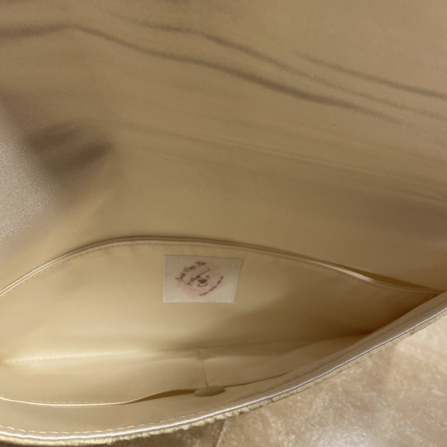 Handmade cream silk clutch handbag with brooch closure