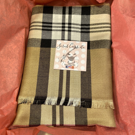 Designer inspired scarf being gift wrapped