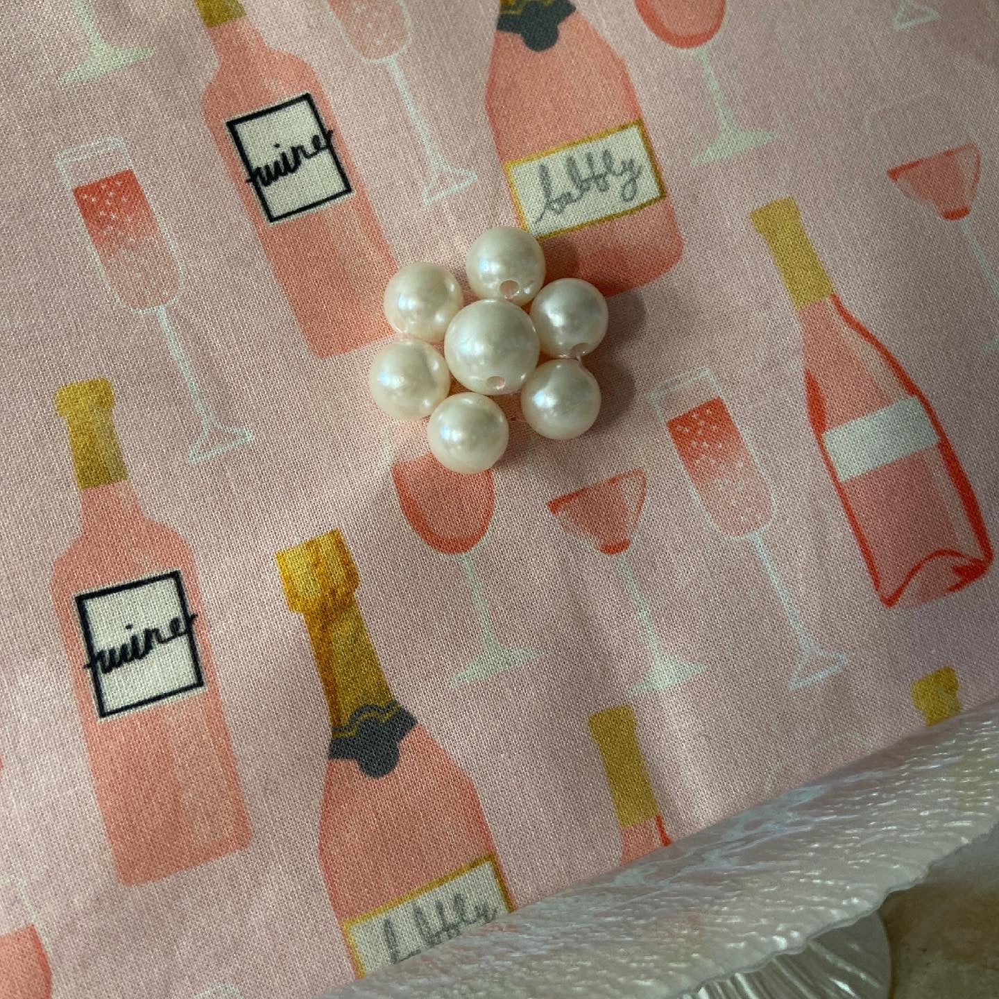 Pink wine/champagne cosmetic bag